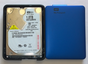 Внешний жесткий диск 1Tb WD My Passport WDBEMM0010BBK-U1 внутри WD10JMVW-11S5XS0